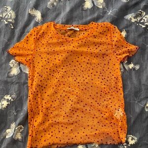 Purple and orange polka dot mesh top